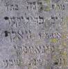 "Here lies the childbearing? woman, the married Channah / Hannah daughter of R. Lejb Perliker Preloker, wife of Wolf Figowski. She died in the 37 year of her life on Sunday 3rd Kislev 5657. May her soul be bound in the bond of everlasting life."